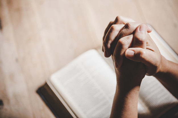 spirituality-religion-hands-folded-prayer-holy-bible-church-concept-faith_1150-12945